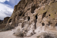 Jamie enjoying the cliffs and caves of Bandelier National Monument