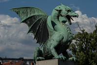 one of four statues at Dragon Bridge