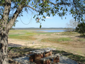 Normally, there's water 10 feet from that picnic table.  The lake is seen, at a historic low, off in the distance.